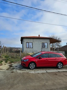 Opel Astra SportsTourer 1.6 BI - Car24.bg Opel Astra SportsTourer 1.6 BI