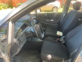 Suzuki Liana 1.6i 4X4 КЛИМАТИК РАБОТИ 135000 КМ - 1350 € / 2640.37 лв. - 70877003 9 | Car24.bg Suzuki Liana 1.6i 4X4 КЛИМАТИК РАБОТИ 135000 КМ - 1350 € / 2640.37 лв. - 70877003 9