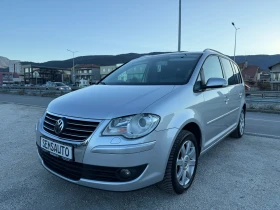 VW Touran 2.0 TDI BMM HIGHLINE 6+ 1 EURO 4 ТОП състояние - Car24.bg VW Touran 2.0 TDI BMM HIGHLINE 6+ 1 EURO 4 ТОП състояние