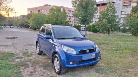Daihatsu Terios 1.5 105кс.4х4 Клима | Auto.bg — изображение 13 Daihatsu Terios 1.5 105кс.4х4 Клима | Auto.bg — изображение 13