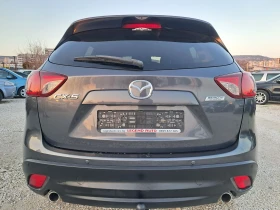 Mazda CX-5 2.2 150к.с НАВИГАЦИЯ ПОДГРЕВ ПАРКТРОНИК - 7200 € / 14081.98 лв. - 95046449 4 | Car24.bg Mazda CX-5 2.2 150к.с НАВИГАЦИЯ ПОДГРЕВ ПАРКТРОНИК - 7200 € / 14081.98 лв. - 95046449 4