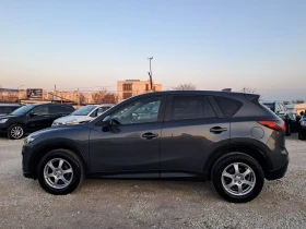 Mazda CX-5 2.2 150к.с НАВИГАЦИЯ ПОДГРЕВ ПАРКТРОНИК - 7200 € / 14081.98 лв. - 95046449 7 | Car24.bg Mazda CX-5 2.2 150к.с НАВИГАЦИЯ ПОДГРЕВ ПАРКТРОНИК - 7200 € / 14081.98 лв. - 95046449 7
