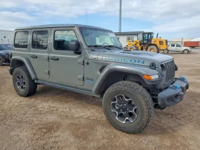 Jeep Wrangler 2.0l Unlimited Rubicon 4Xe - 18600 € / 36378.44 лв. - 98542566 4 | Car24.bg Jeep Wrangler 2.0l Unlimited Rubicon 4Xe - 18600 € / 36378.44 лв. - 98542566 4