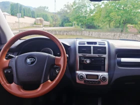 Kia Sportage 2.0i.4x4.klima.koja. | Auto.bg — изображение 11 Kia Sportage 2.0i.4x4.klima.koja. | Auto.bg — изображение 11