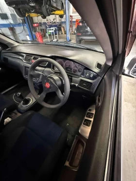 Mitsubishi Lancer EVOLUTION VII| РЪЧНИ СКОРОСТИ| ДЕСЕН ВОЛАН| | Auto.bg — изображение 5 Mitsubishi Lancer EVOLUTION VII| РЪЧНИ СКОРОСТИ| ДЕСЕН ВОЛАН| | Auto.bg — изображение 5