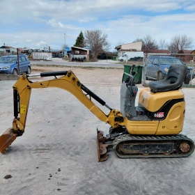 Обява за продажба на Багер Cat 008CR * НАЛИЧЕН * РАЗШИРЯЕМИ ВЕРИГИ *