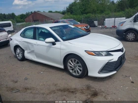 Toyota Camry 2.5L I-4 DI, DOHC, VVT, 203HP Front Wheel Drive