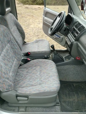 Suzuki Jimny 1.3i 16v - 3250 € / 6356.45 лв. - 26714786 5 | Car24.bg Suzuki Jimny 1.3i 16v - 3250 € / 6356.45 лв. - 26714786 5