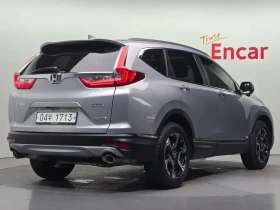 Honda Cr-v 1.5 Touring 4Wd | Auto.bg — изображение 2 Honda Cr-v 1.5 Touring 4Wd | Auto.bg — изображение 2