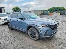 Mazda CX-50 4X4| PANO| DISTRONIC| PODGREV| CAMERA| BLIND-SPOT | Auto.bg — изображение 3 Mazda CX-50 4X4| PANO| DISTRONIC| PODGREV| CAMERA| BLIND-SPOT | Auto.bg — изображение 3