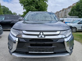 Mitsubishi Outlander 2.2DI-D 4WD AVTOMAT/KAMERA/NAVI EURO 6 - Car24.bg Mitsubishi Outlander 2.2DI-D 4WD AVTOMAT/KAMERA/NAVI EURO 6