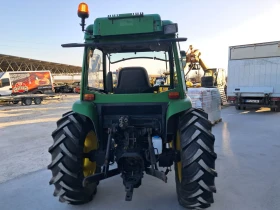 Трактор John Deere 4710