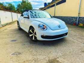 Обява за продажба на VW New beetle * CABRIO* NAVI* R-LINE* EXCLUSIVE* LEATHER* PDC* A ~31 999 лв. - изображение 1