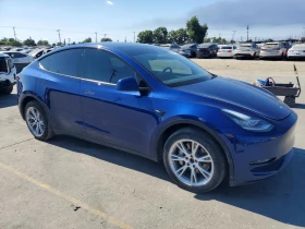 Tesla Model Y DUAL MOTOR /AWD / LONG RANGE / 82.1 KWH | Auto.bg — изображение 4 Tesla Model Y DUAL MOTOR /AWD / LONG RANGE / 82.1 KWH | Auto.bg — изображение 4