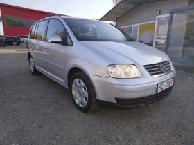 VW Touran 1.9TDI, 7 места, темпомат, 6 скорости - Car24.bg VW Touran 1.9TDI, 7 места, темпомат, 6 скорости