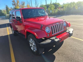 Jeep Wrangler * 4wd 4dr Sahara * CARFAX * ПОДГРЕВ * REMOTE START | Auto.bg — изображение 2 Jeep Wrangler * 4wd 4dr Sahara * CARFAX * ПОДГРЕВ * REMOTE START | Auto.bg — изображение 2