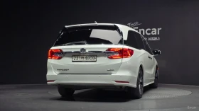 Honda Odyssey 3.5* ELITE* ПОДГРЕВ* ОБДУХВАНЕ* TV* ШИБИДАХ* | Auto.bg — изображение 4 Honda Odyssey 3.5* ELITE* ПОДГРЕВ* ОБДУХВАНЕ* TV* ШИБИДАХ* | Auto.bg — изображение 4