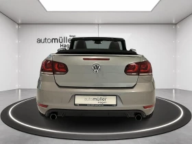 VW Golf 2.0 TSI GTI Cabrio DSG DYN-A| NAVI| TEMPO| AHK - 12990 € / 25406.23 лв. - 93172527 5 | Car24.bg VW Golf 2.0 TSI GTI Cabrio DSG DYN-A| NAVI| TEMPO| AHK - 12990 € / 25406.23 лв. - 93172527 5