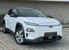 Hyundai Kona Premium 64 kWh ТЕРМОПОМПА КАМЕРА LED DISTRONIC 1 - Car24.bg Hyundai Kona Premium 64 kWh ТЕРМОПОМПА КАМЕРА LED DISTRONIC 1