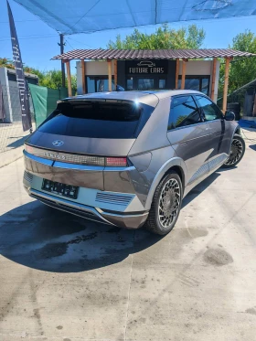 Hyundai Ioniq 5 72.6KWh/UNIQ/360/HEADUP/PANO/BOSE/ГАРАНЦИЯ - 26499 € / 51827.54 лв. - 58657224 6 | Car24.bg Hyundai Ioniq 5 72.6KWh/UNIQ/360/HEADUP/PANO/BOSE/ГАРАНЦИЯ - 26499 € / 51827.54 лв. - 58657224 6
