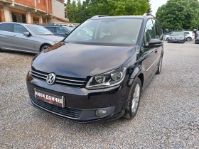 VW Touran 2.0-140TDI! NAVI! KOJA! PANORAMA! 6+ 1! 6скорости! 1 - Car24.bg VW Touran 2.0-140TDI! NAVI! KOJA! PANORAMA! 6+ 1! 6скорости! 1