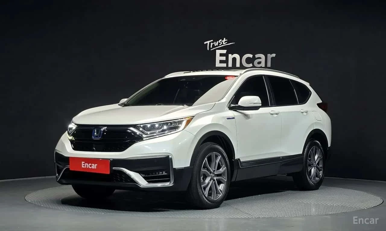 Honda Cr-v * 2.0 Hybrid Touring 4WD * 50k KM * Цена до бг * | Auto.bg — изображение 1 Honda Cr-v * 2.0 Hybrid Touring 4WD * 50k KM * Цена до бг * | Auto.bg — изображение 1