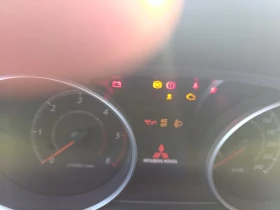 Mitsubishi Outlander 2.2 160 к.с Топ състояние | Auto.bg — изображение 11 Mitsubishi Outlander 2.2 160 к.с Топ състояние | Auto.bg — изображение 11