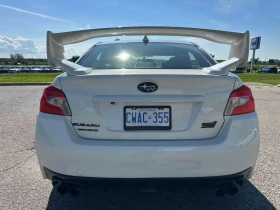Subaru WRX 4dr Sdn STI Man w/Sport Pkg CARFAX | Auto.bg — изображение 4 Subaru WRX 4dr Sdn STI Man w/Sport Pkg CARFAX | Auto.bg — изображение 4