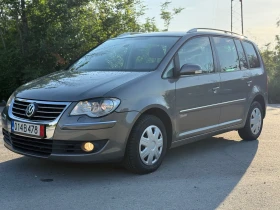 VW Touran 2.0TDI PD/BMM ФЕЙС НОВ ВНОС КЛИМАТРОНИК ПОДГРЕВ - Car24.bg VW Touran 2.0TDI PD/BMM ФЕЙС НОВ ВНОС КЛИМАТРОНИК ПОДГРЕВ