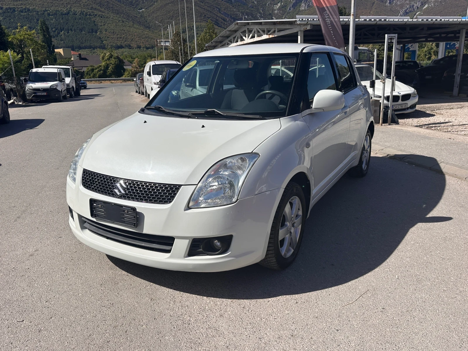 Suzuki Swift 4X4 - 1.3i - РЕАЛНИ КИЛОМЕТРИ - УНИКАТ | Auto.bg — изображение 1 Suzuki Swift 4X4 - 1.3i - РЕАЛНИ КИЛОМЕТРИ - УНИКАТ | Auto.bg — изображение 1