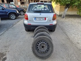 Fiat Sedici 4х4--1, 6i--ТОП СЪСТОЯНИЕ - Car24.bg Fiat Sedici 4х4--1, 6i--ТОП СЪСТОЯНИЕ
