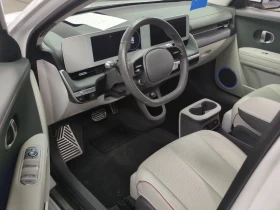 Hyundai Ioniq 5 77.4KWh 325к.с/4X4/UNIQ/40000km - 35998 € - 61138165 4 | Car24.bg Hyundai Ioniq 5 77.4KWh 325к.с/4X4/UNIQ/40000km - 35998 € - 61138165 4