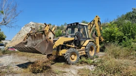 Багер Caterpillar 428B