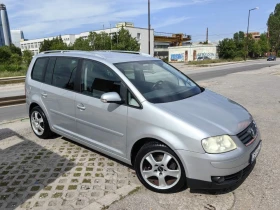 VW Touran 2, 0 TDI / КОЖА / ПОДГРЕВ / АВТОМАТИК - Car24.bg VW Touran 2, 0 TDI / КОЖА / ПОДГРЕВ / АВТОМАТИК