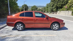 Skoda Octavia 1.6 MPI 102 к.с. бензин/газ | Auto.bg — изображение 3 Skoda Octavia 1.6 MPI 102 к.с. бензин/газ | Auto.bg — изображение 3