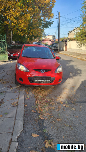     Mazda 2 ~8 000 .