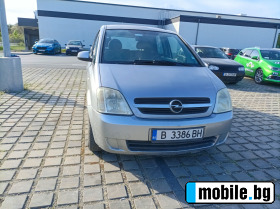     Opel Meriva ~3 500 .
