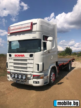     Scania 124   ~36 000 .