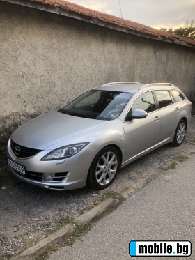     Mazda 6 ~10 000 .