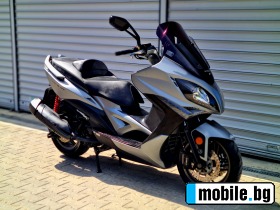     Kymco Xciting 400i ABS ~5 100 .