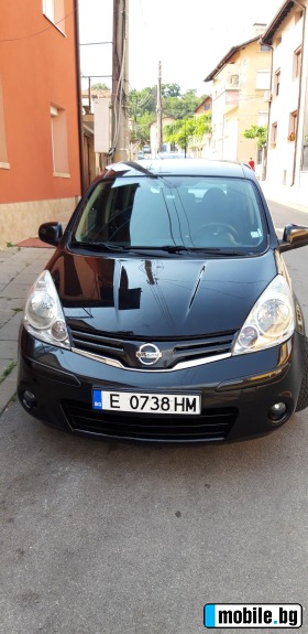     Nissan Note 1.4  ~8 700 .