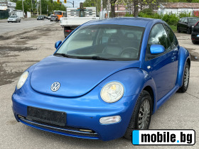     VW New beetle ~2 350 .