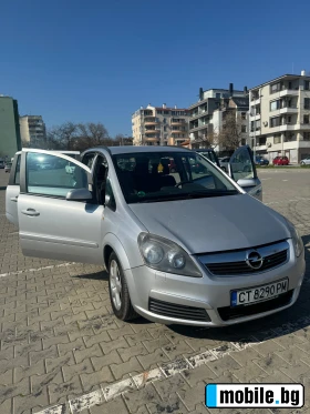     Opel Zafira ~5 500 .