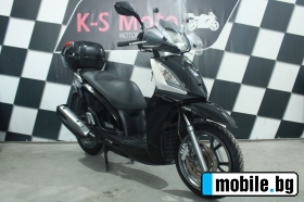     Kymco People 300i ABS 2015. ~3 200 .