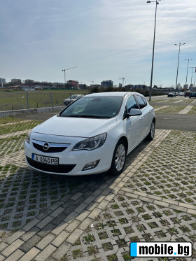     Opel Astra ~10 600 .