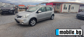     Nissan Note 1.6i  ~8 500 .