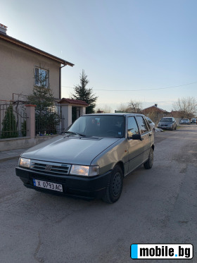     Fiat Uno ~5 500 .