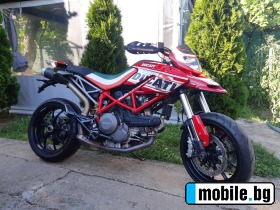     Ducati Hypermotard  800i ~8 500 .