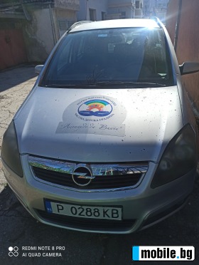     Opel Zafira 1.8 ~5 200 .