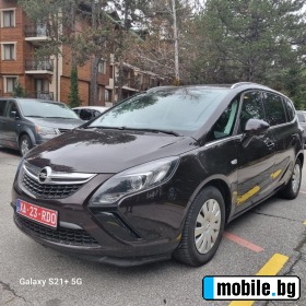     Opel Zafira ~15 300 .